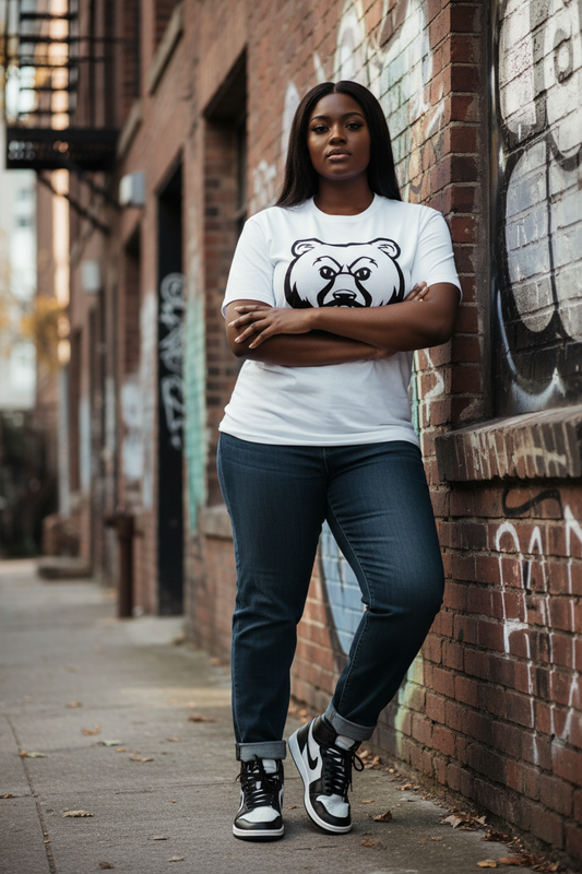 Plus size Black woman in white OG Bear Tee with Jordan 1s