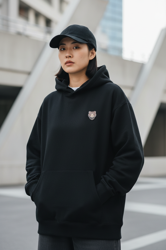 Brown bear pin on hoodie
