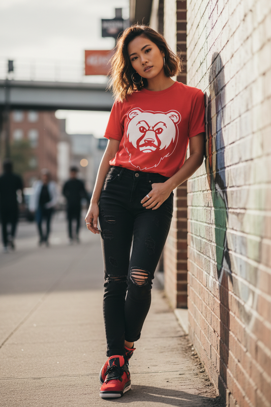 Slim Asian woman in red OG Bear Tee with Jordan 4s
